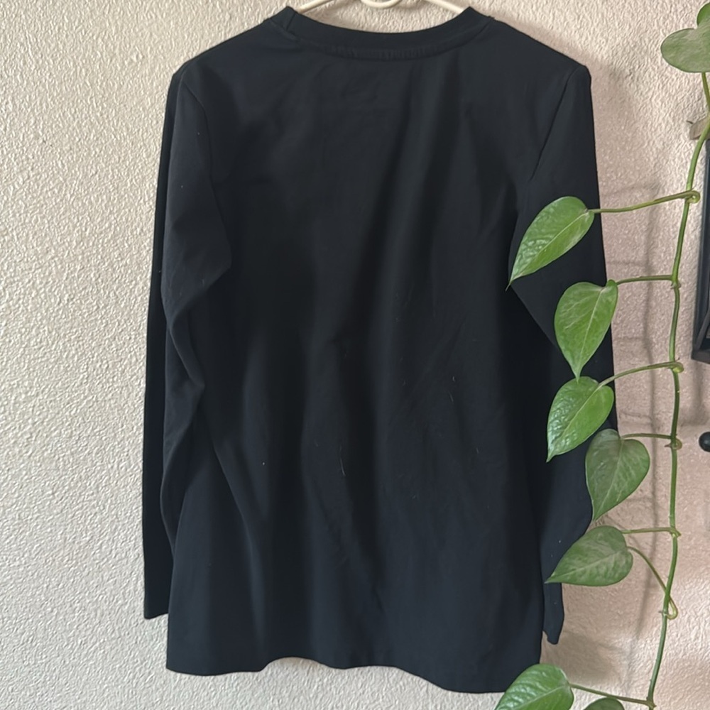 If a girl wants to be a legend long sleeve shirt - Picture 4 of 4